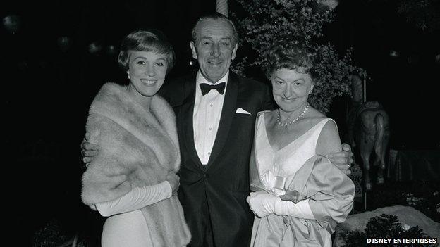 Taken at the Los Angeles premiere of "Mary Poppins"..Left to right: Julie Andrews, Walt Disney, P.L. Travers..Copyright Disney Enterprises, Inc.