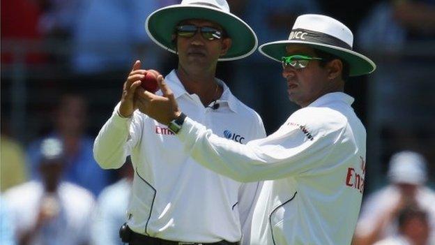 Umpires Kumar Dharmasena and Aleem Dar