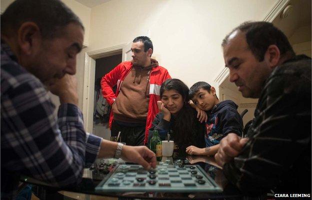 A game of draughts between Jiri and his older brother, who is visiting from the Czech Republic