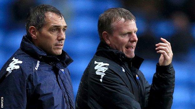 Andy Awford (right) with former Portsmouth manager Guy Whittingham.