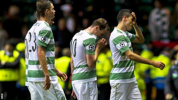 Disappointed Celtic players after the defeat to Milan