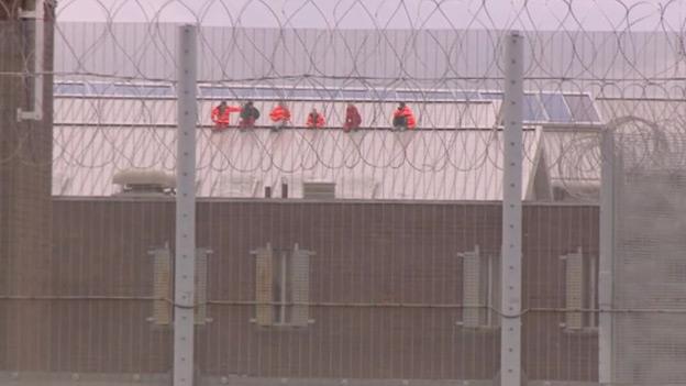 Prisoners on roof