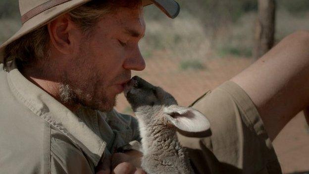 Chris Barns and one of his joeys