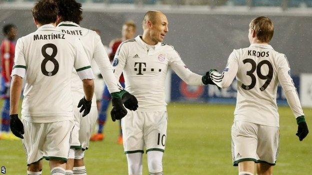 Bayern's Arjen Robben (centre) celebrates scoring the opening goal during the Champions League group D soccer match between CSKA Moscow and Bayern Munich