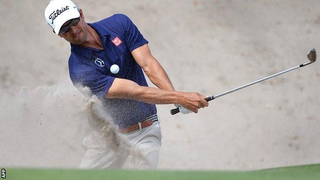 Adam Scott in first-round action at the Australian Open