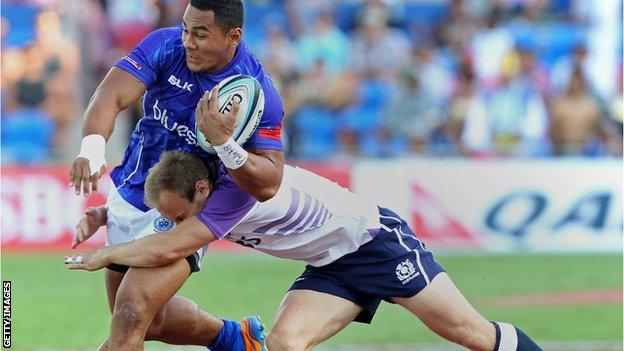 Samoa's Meki Magele is tackled by Scotland's Andrew Turnbull