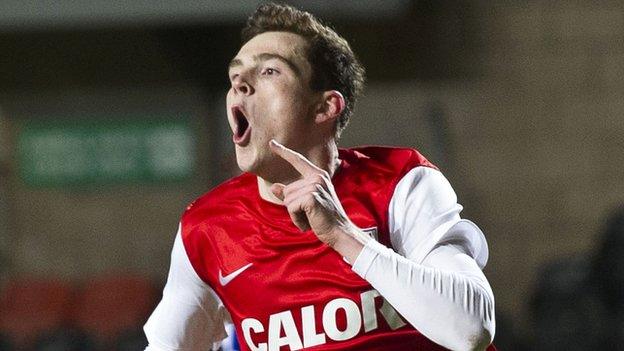 Dundee United's Andy Robertson celebrates