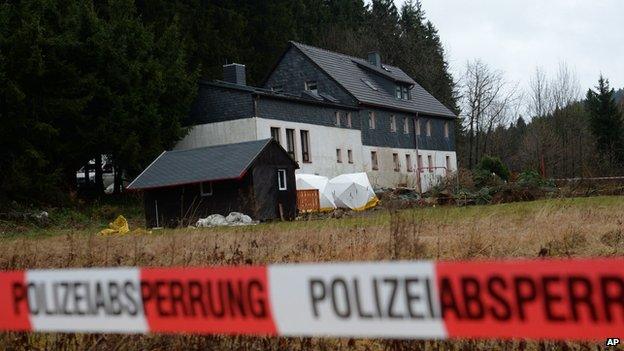 Police cordons block a property near Reichenau, eastern Germany Friday Nov. 29, 2013