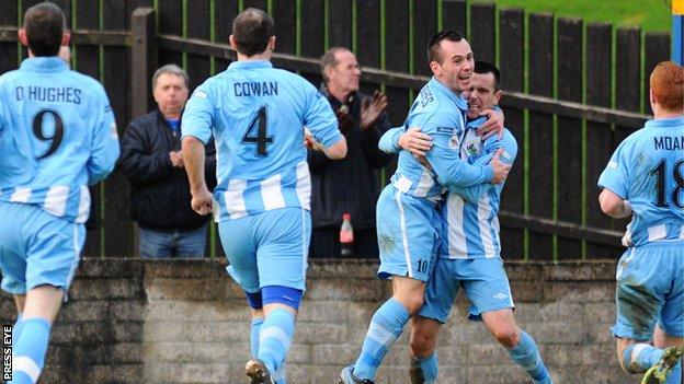 Stephen Hughes celebrates scoring the opener for Warrenpoint against Coleraine