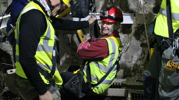 Lesley Woodbridge being lowered into the shaft