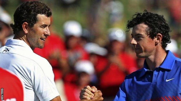 Adam Scott and Rory McIlroy