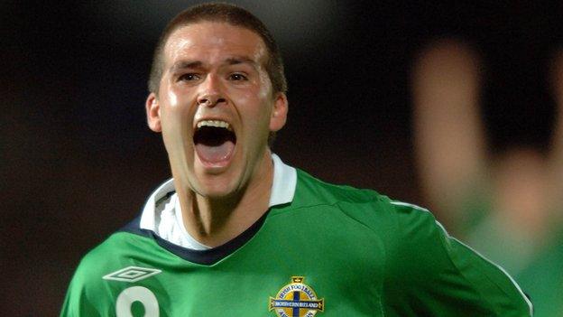 David Healy celebrates after completing his Northern Ireland hat-trick in the win over Spain in September 2006