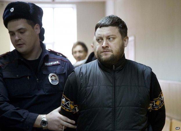 Yuri Zarutsky is led into court in Moscow, 3 December