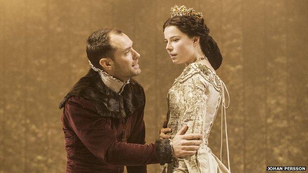 Jude Law as Henry V and Jessie Buckley as Princess Katharine