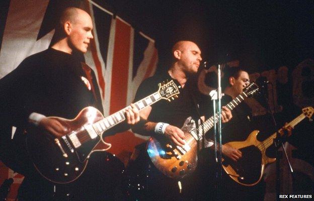 Skrewdriver playing on stage in 1988