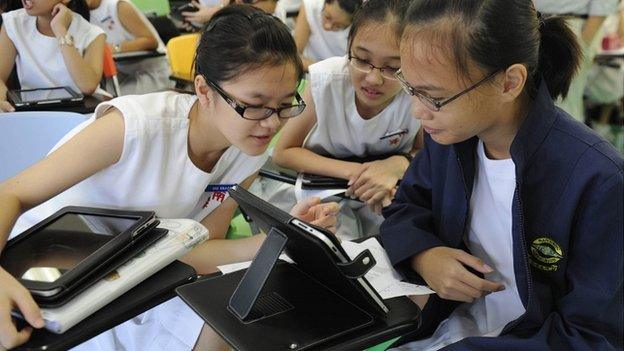 Pupils in Singapore with tablet computers