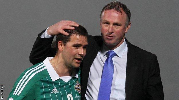 David Healy with Northern Ireland manager Michael O'Neill