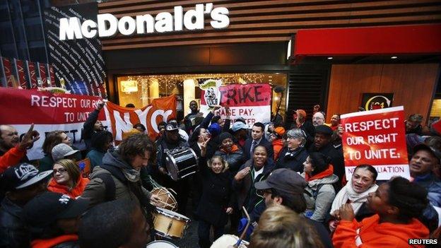 Fast food workers protest against McDonald's in New York on 5 December 2013