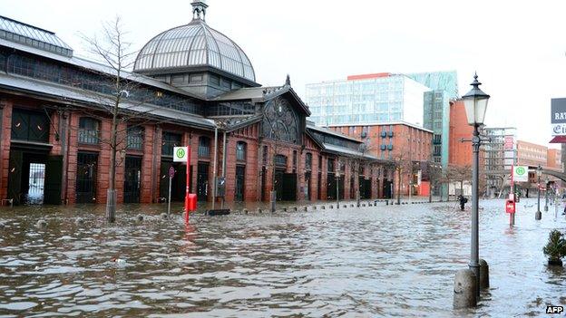 Flooded fish market in Hamburg, 6 Dec 13