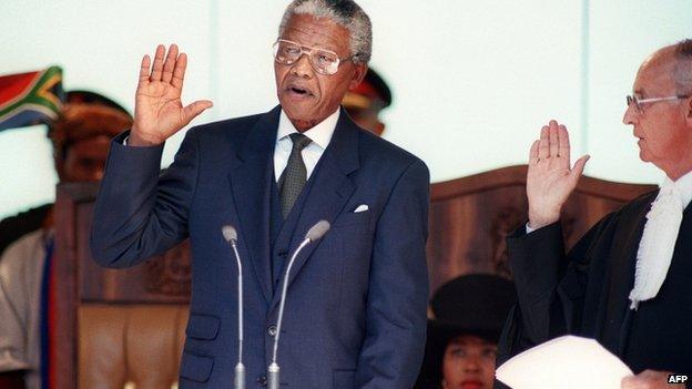 Nelson Mandela takes his oath on 10 May 1994 during his inauguration as president at the Union Building in Pretoria, South Africa