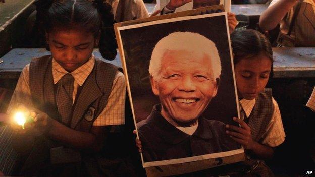 Children with a photograph of Nelson Mandela