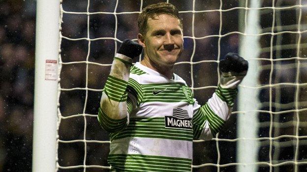 Kris Commons celebrates