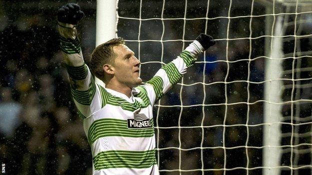 Kris Commons celebrates