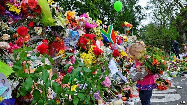 Wall of flowers outside Mr Mandela's home in Houghton. 7 Dec 2013