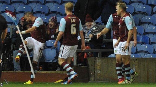 Michael Kightly celebrates