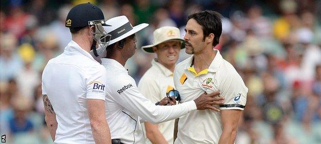 Ben Stokes, umpire Kumar Dharmasena & Mitchell Johnson