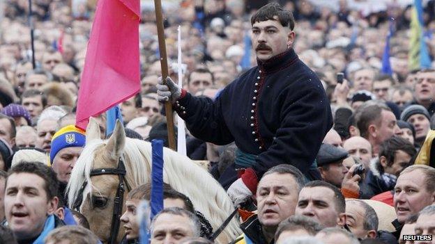 A man on a horse at the rally on Independence Square.