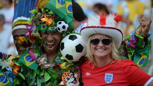 A Brazil and England supporter smiling before a FiFA World Cup Brazil 2014 friendly football match between Brazil and England at Maracana stadium in Rio de Janeiro, Brazil, on June 2, 2013.