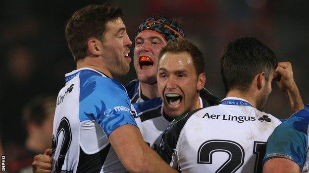 Dan Parks and a number of his Connacht team-mates celebrate after the final whistle in Toulouse