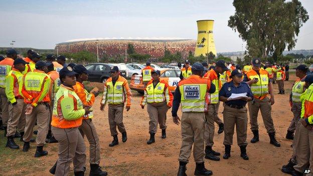 Police at the FNB stadium in Johannesburg, 9 Dec