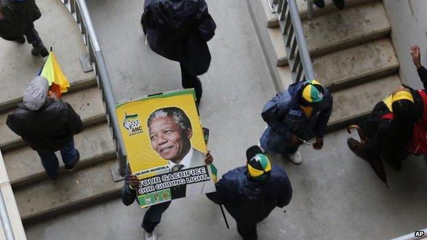 Crowds at a memorial service for Nelson Mandela, 10 Dec