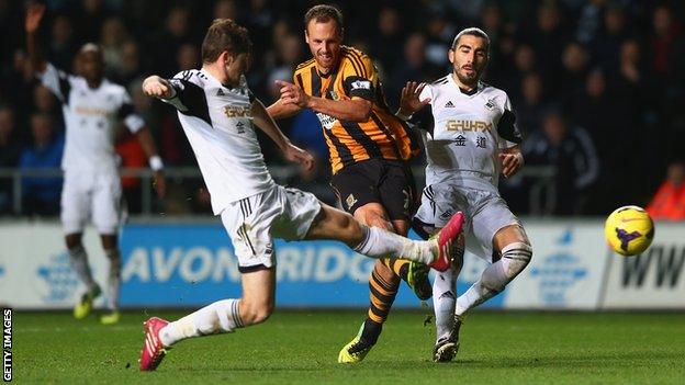 Swansea City defender Ben Davies and Hull City's David Meyler