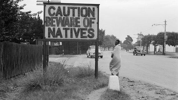 A sign common in Johannesburg, South Africa, reading 'Caution Beware Of Natives' (1956)