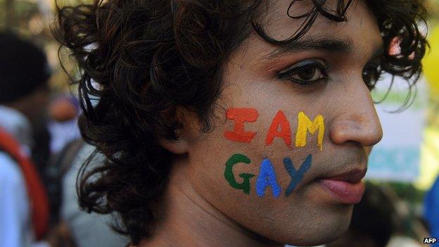 A participant at a gay pride rally in India