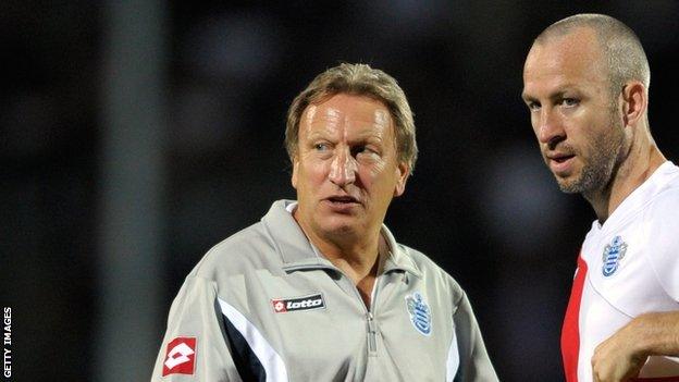 Neil Warnock (left) and Shaun Derry at QPR