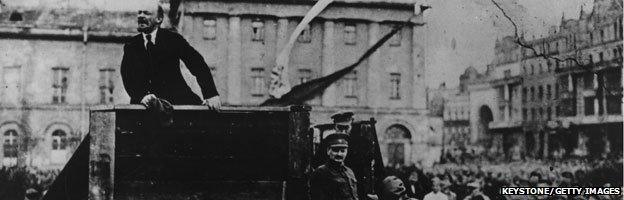 Lenin addresses a huge crowd in Sverdlov Square Moscow with Leon Trotsky to the right of the podium