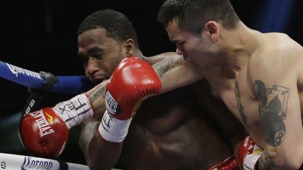 Adrien Broner (left) is caught with a punch from Marcos Maidana