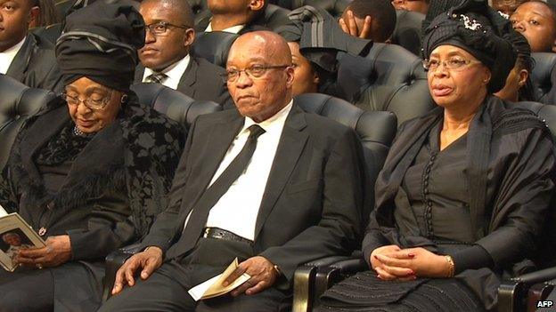 President Jacob Zuma sat between Nelson Mandela's widow Graca Machel and his ex-wife Winnie Madikizela-Mandela