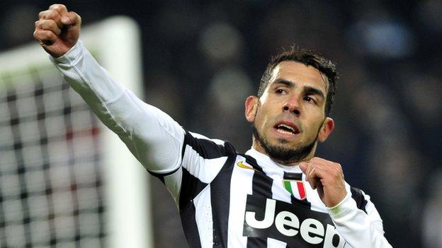 Juventus striker Carlos Tevez celebrates after scoring against Sassuolo