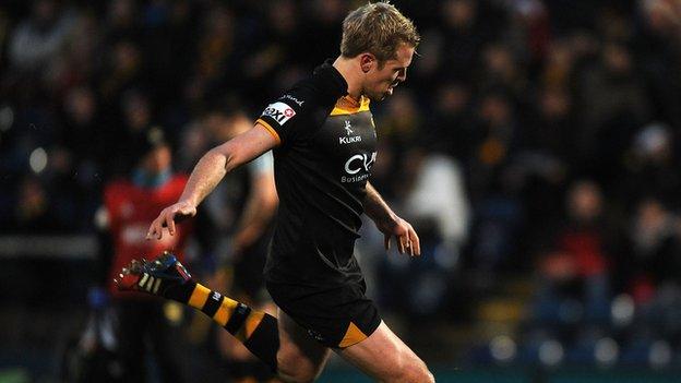 Joe Carlisle of London Wasps kicks a penalty during the Amlin Challenge Cup match between London Wasps and Grenoble