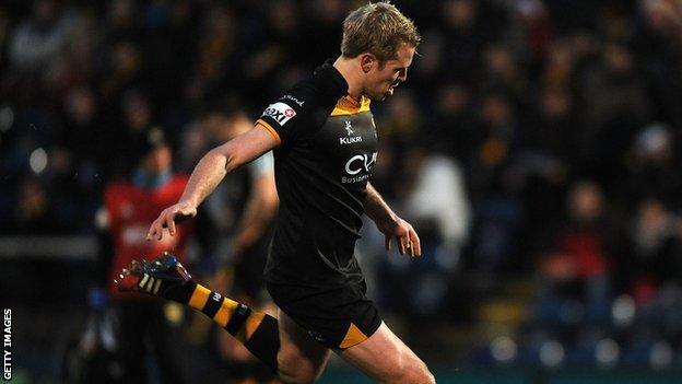 Joe Carlisle of London Wasps kicks a penalty during the Amlin Challenge Cup match between London Wasps and Grenoble