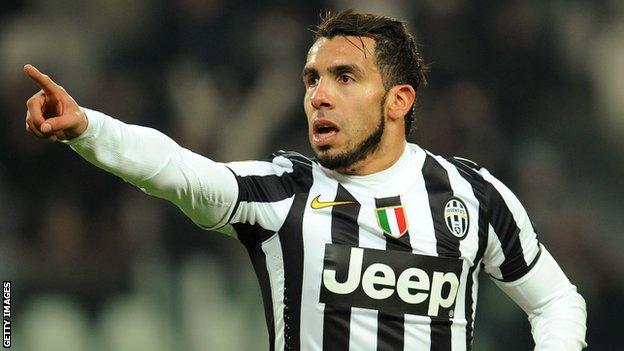 Juventus striker Carlos Tevez celebrates after scoring against Sassuolo