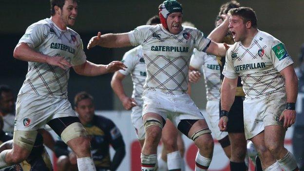 Tom Youngs (R) of Leicester Tigers celebrates scoring his sides first try against Montpellier.