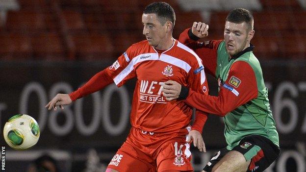 Portadown's Ryan McStay battles with Glentoran's Mark Clarke in the recent Premiership clash