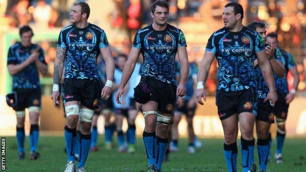 Exeter Chiefs players trudge off after their defeat by Toulon