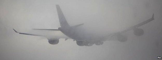 A plan taking off from Heathrow in thick fog